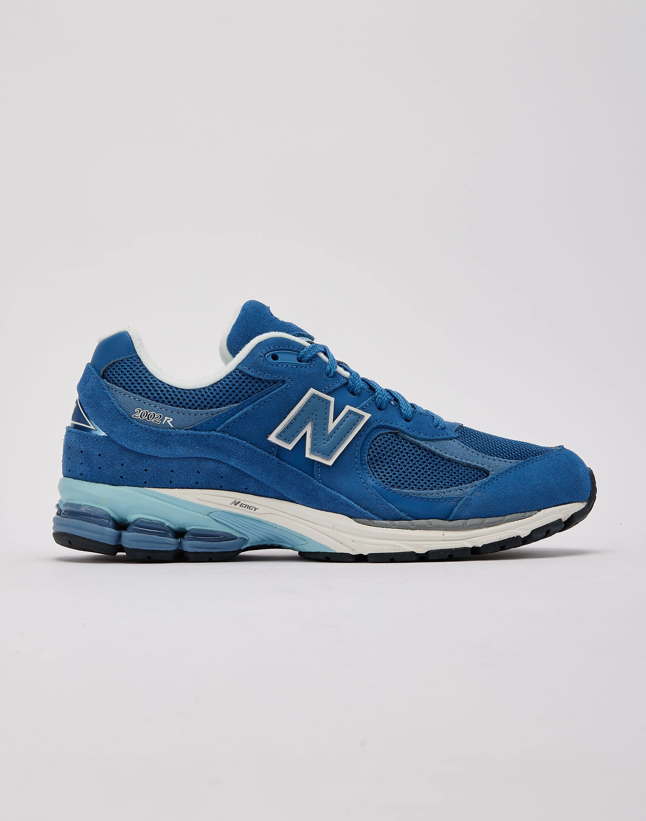 regional - themed running shoes New Balance 2002R