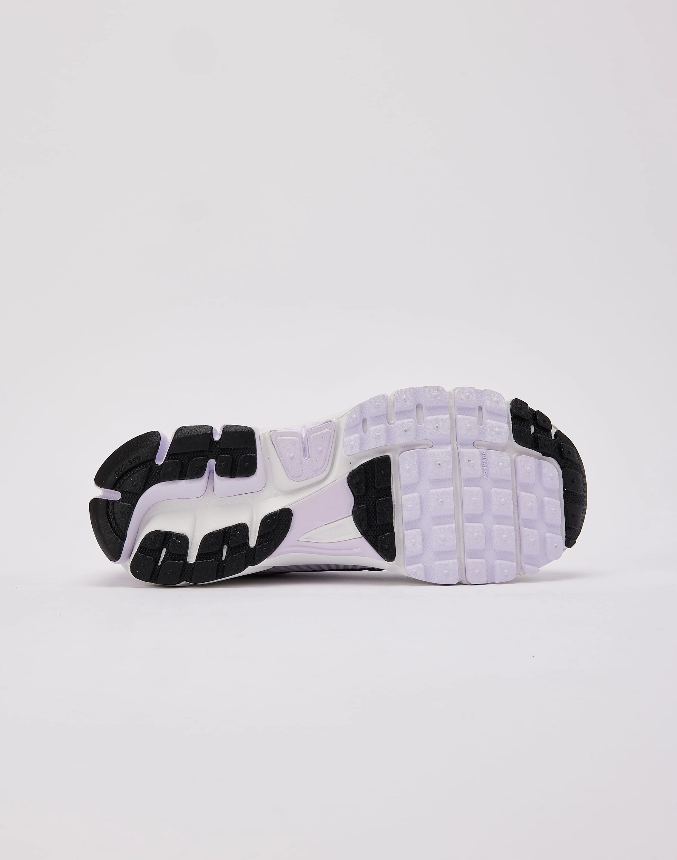 running in solid colors Nike Zoom Vomero 5