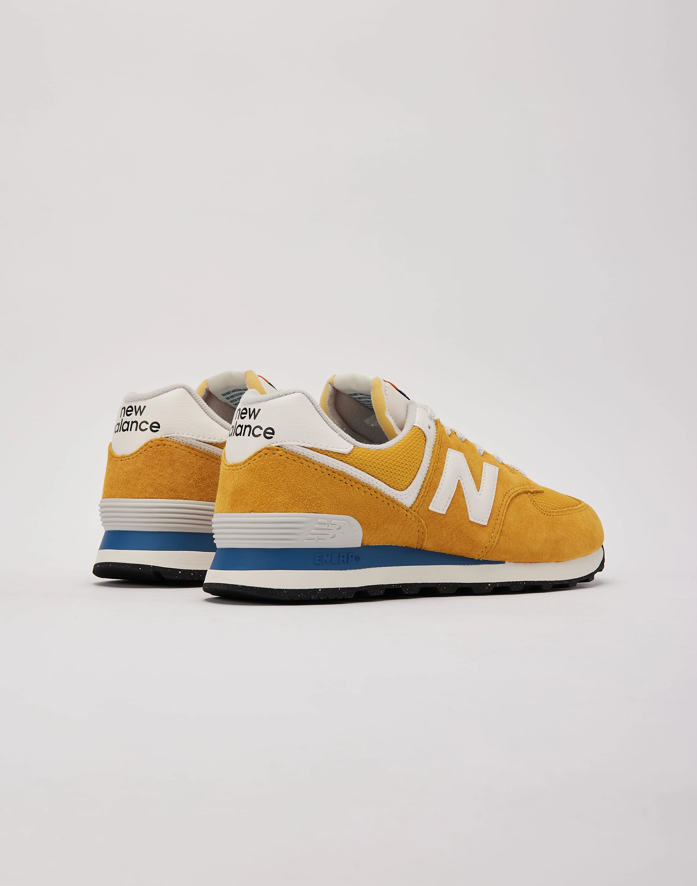 neon running wear New Balance 574