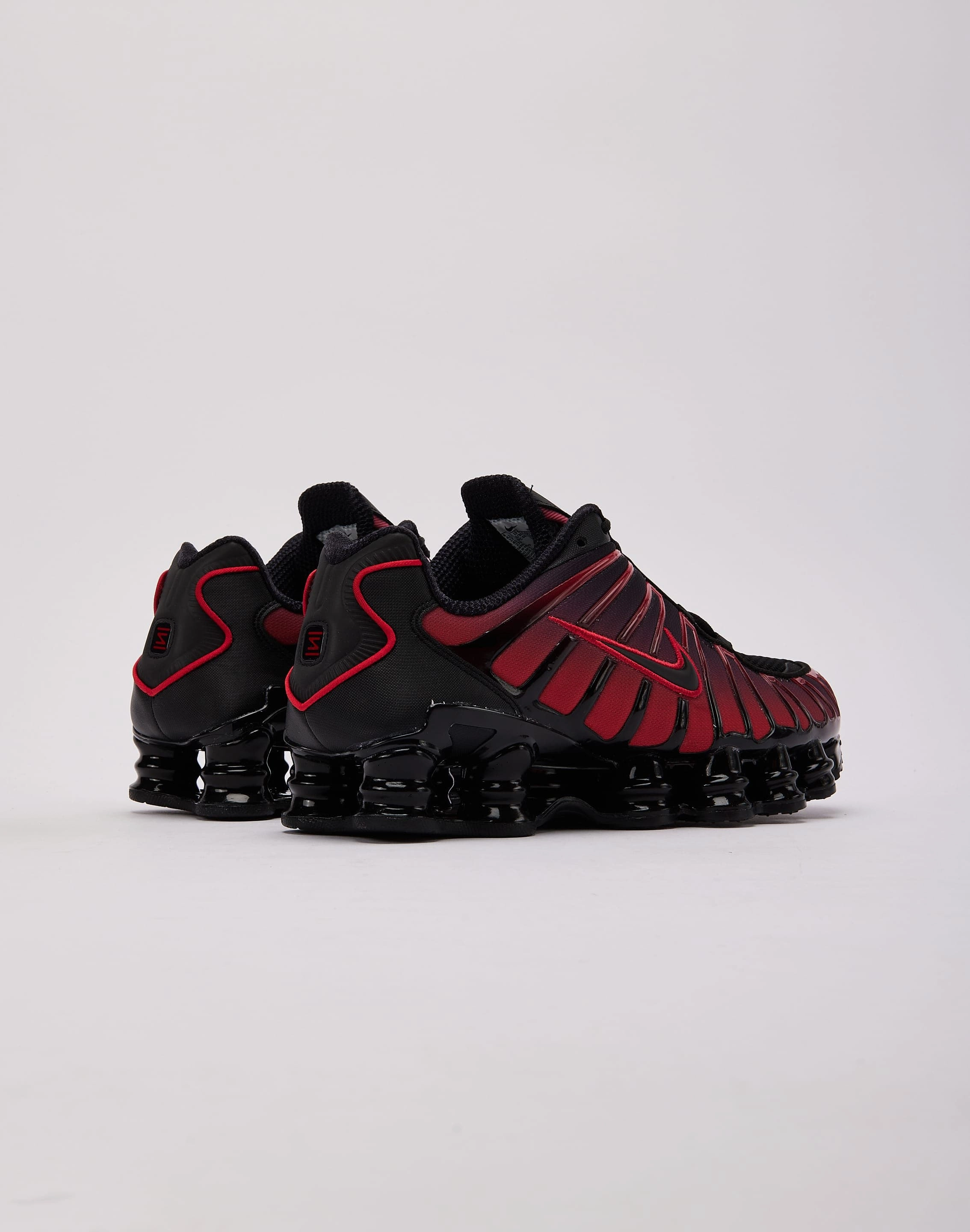 running in wide tracks shoes Nike Shox TL