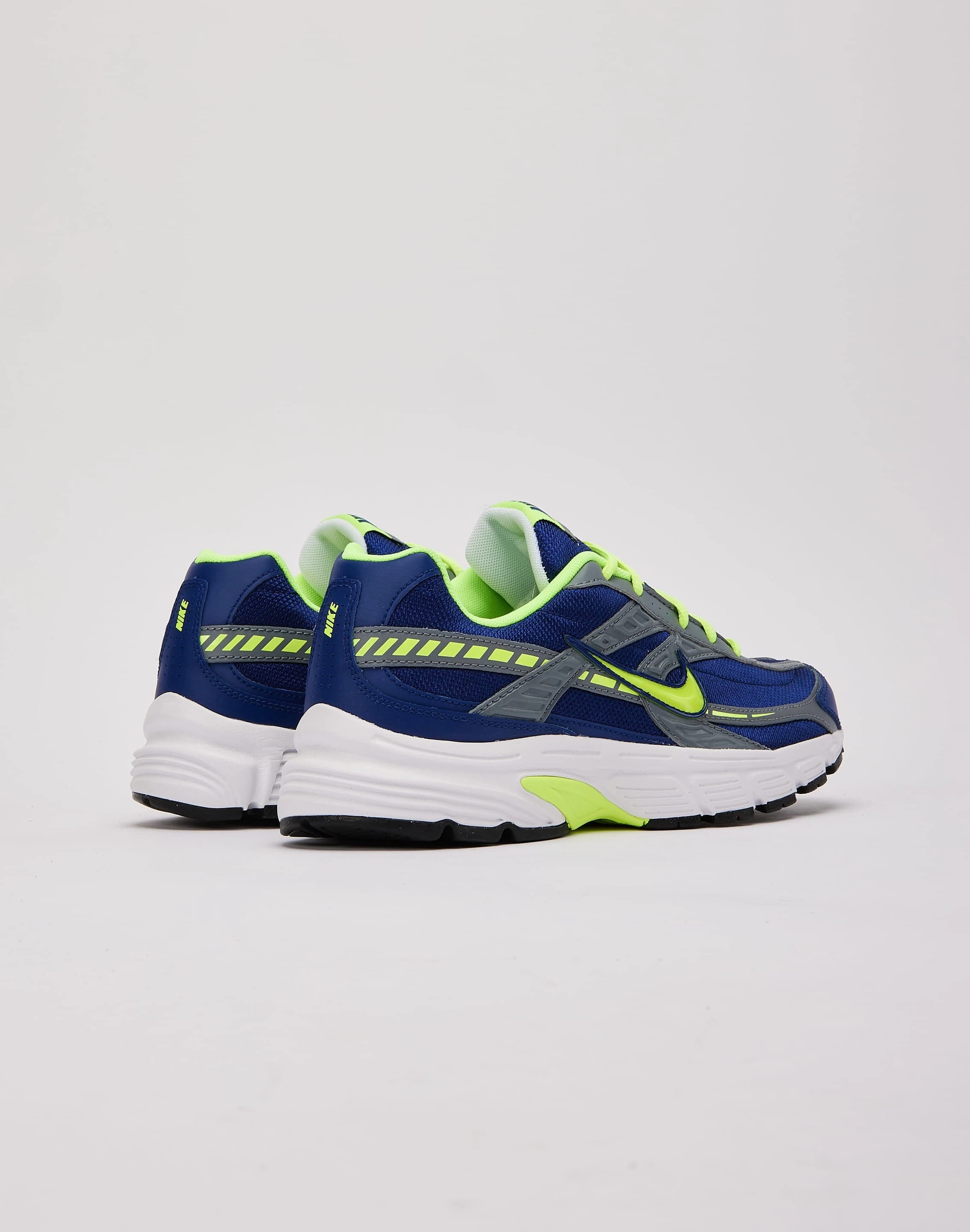 mid - top shoe variety cricket - ground running shoes Nike Initiator