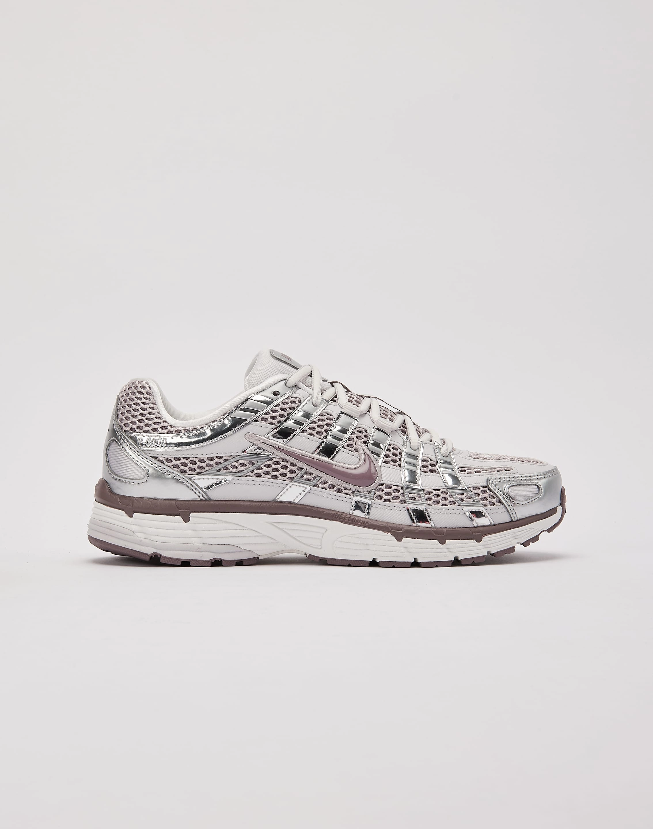 Nike P-6000 running on downhill shoes