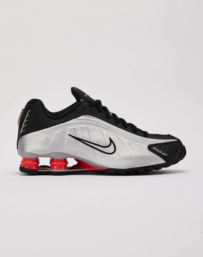 running in a ski resort area shoes jogging footwear Nike  Shox R4