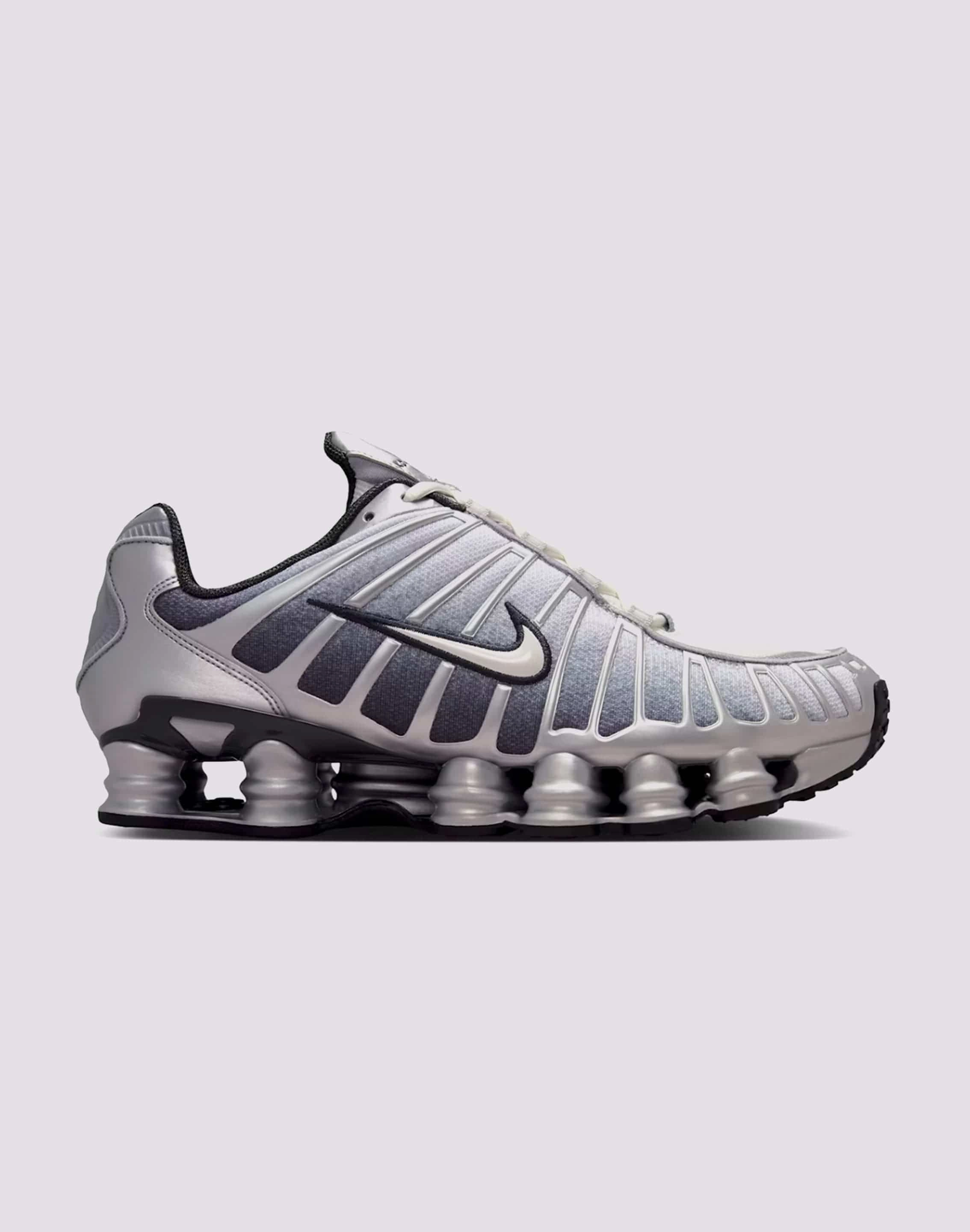 Split Outsole Design label Nike Shox TL