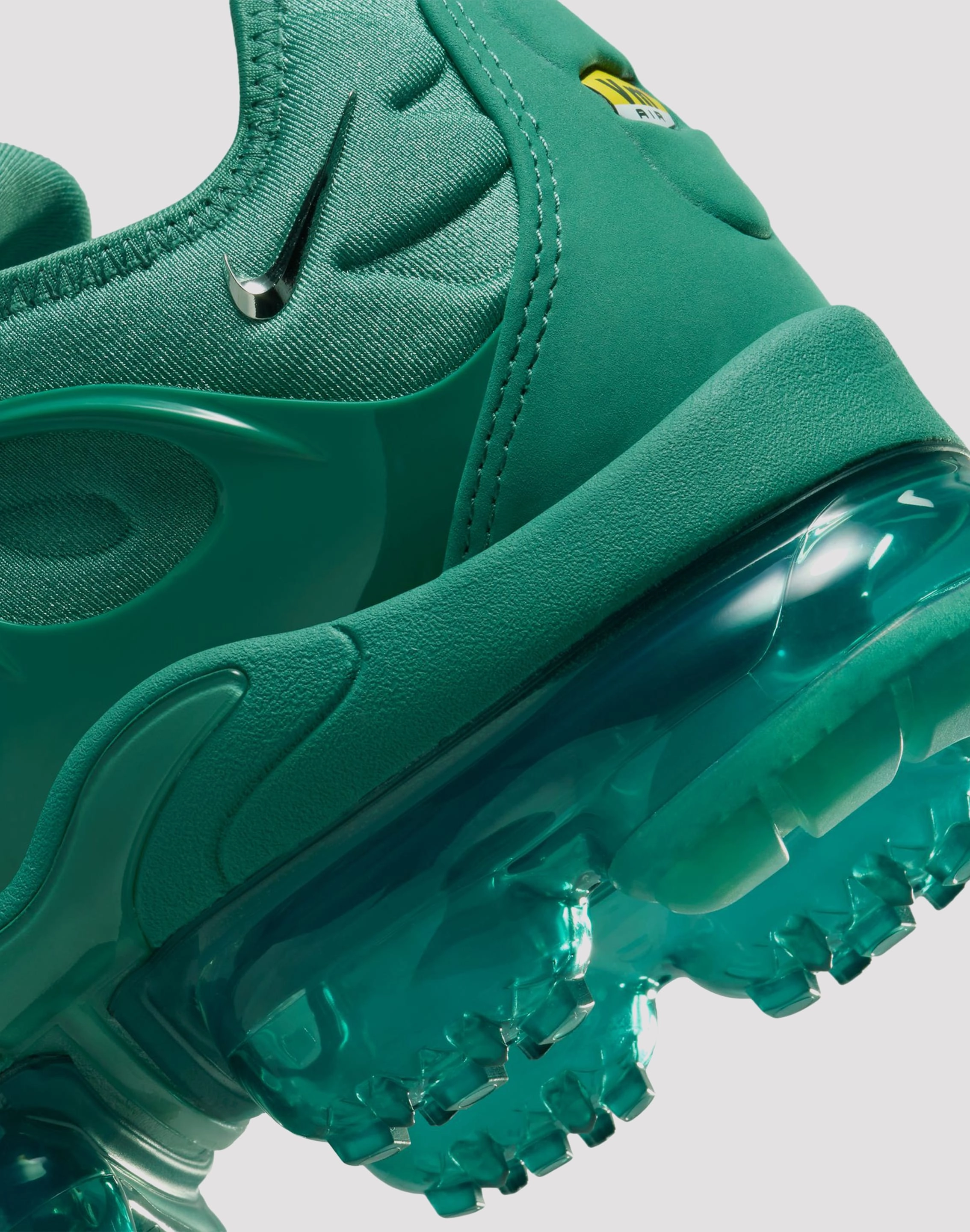 Nike VaporMax Plus "Bicoastal/Chrome/Metallic Silver" running with knee braces