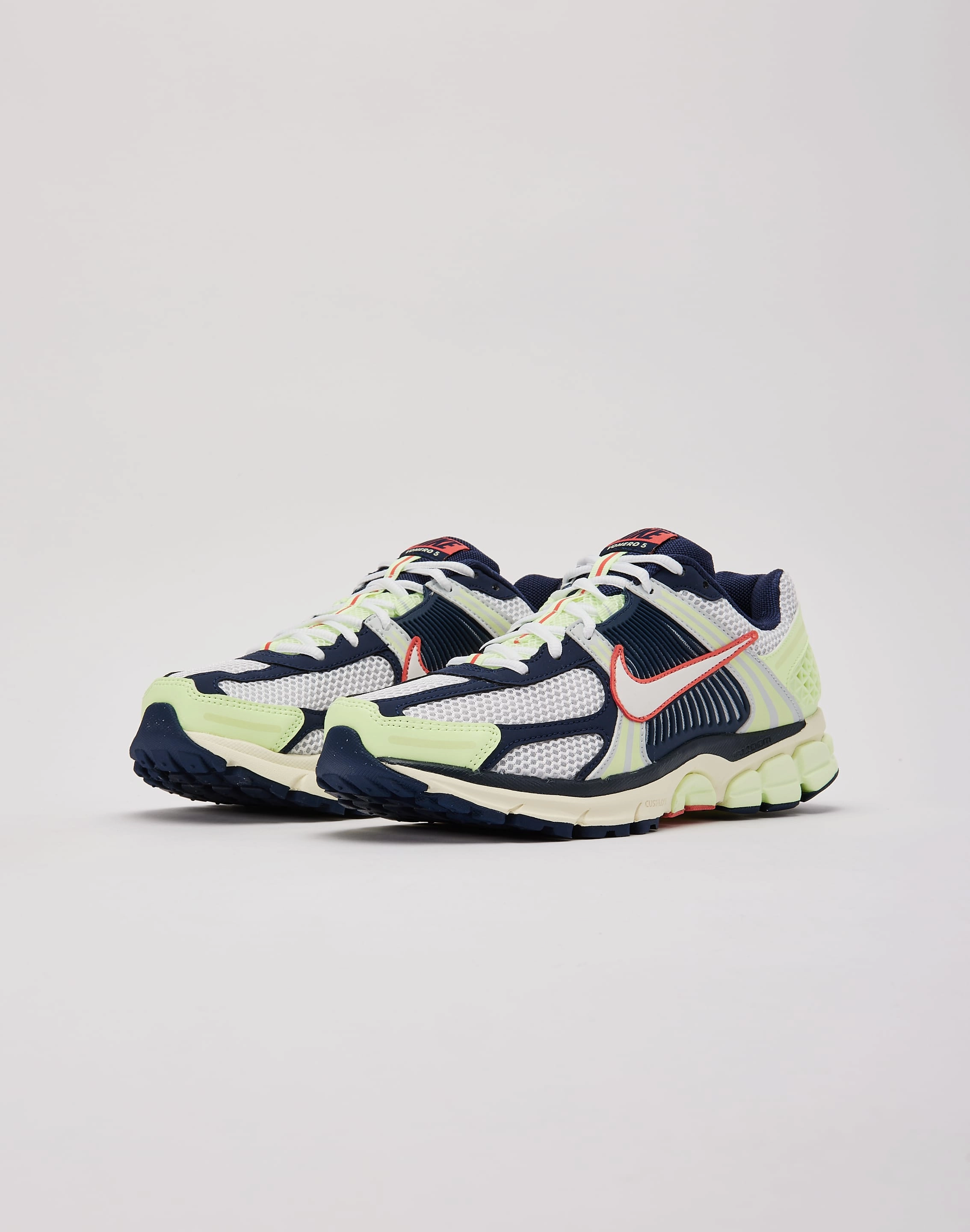 Nike Zoom Vomero 5 running in a road race shoes