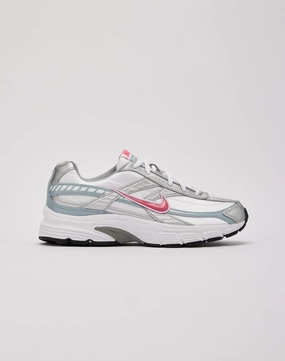 cold - weather - runner running in poorly - maintained tracks shoes Nike Initiator